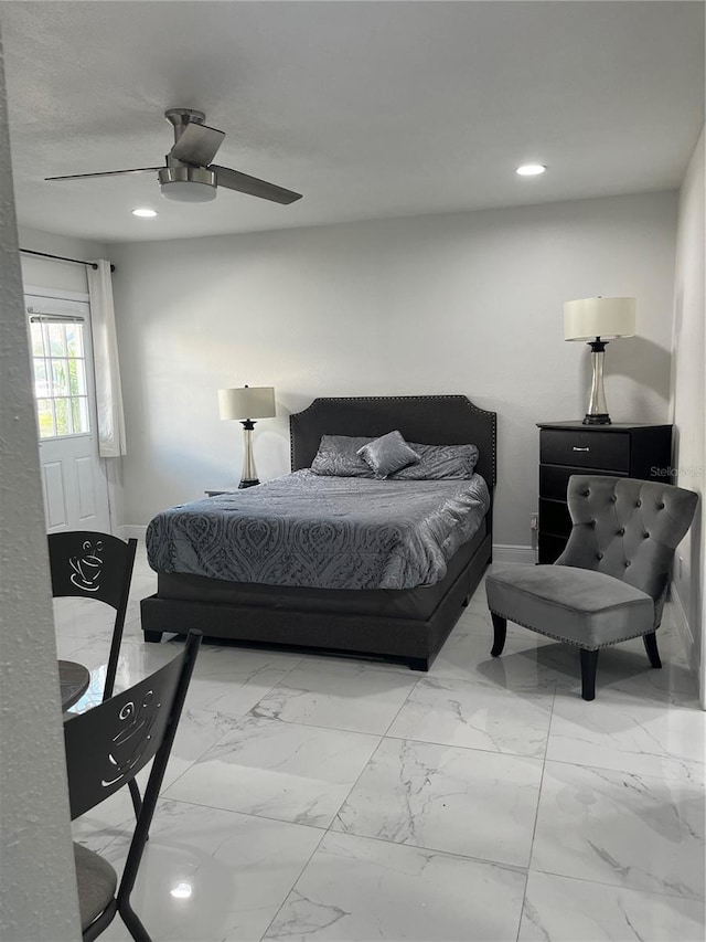 121 White Birch Dr, Kissimmee, FL 34743 - bedroom with ceiling fan, recessed lighting, and marble look tile flooring
