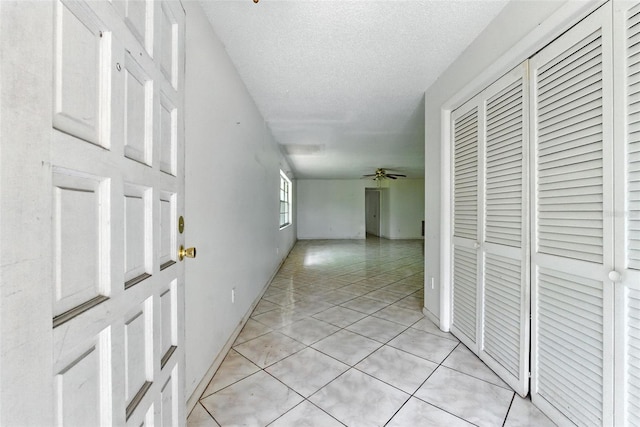 3252 Golfview Rd, Sebring, FL 33875 - hall featuring light tile patterned flooring and a textured ceiling
