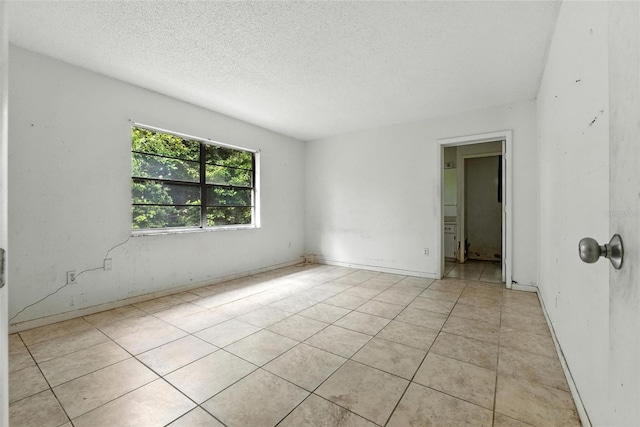 3252 Golfview Rd, Sebring, FL 33875 - spare room with a textured ceiling and light tile patterned floors