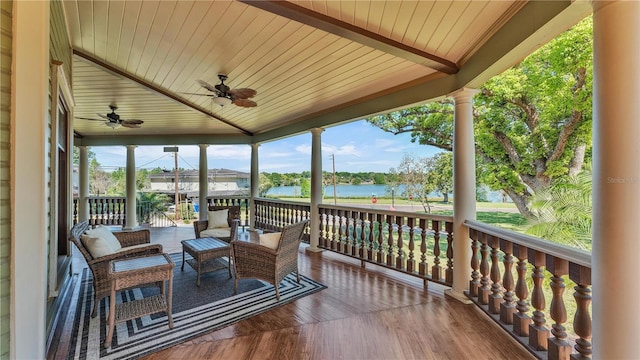 822 W Patterson St, Lakeland, FL 33803 - deck featuring ceiling fan and a water view