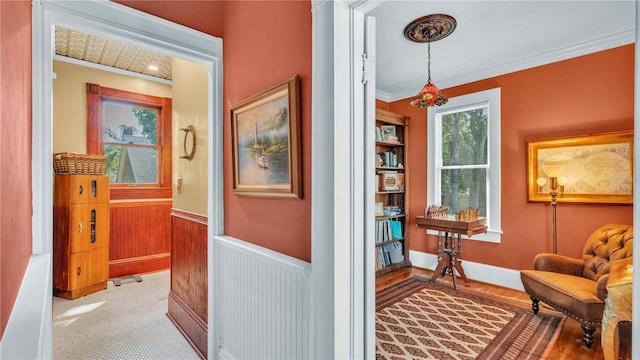 822 W Patterson St, Lakeland, FL 33803 - hallway with a wainscoted wall and crown molding