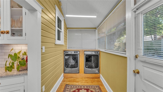 822 W Patterson St, Lakeland, FL 33803 - laundry area with separate washer and dryer, light wood-style floors, and baseboards