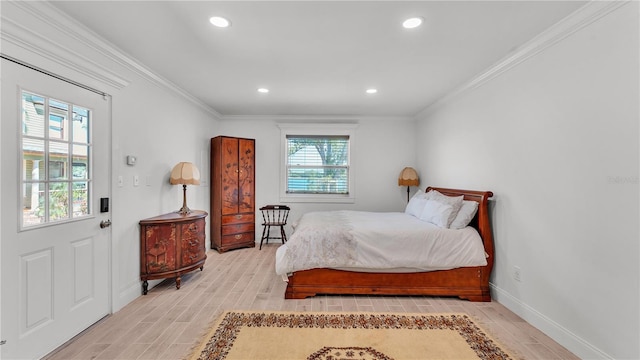 822 W Patterson St, Lakeland, FL 33803 - bedroom with light wood-type flooring, ornamental molding, baseboards, and recessed lighting