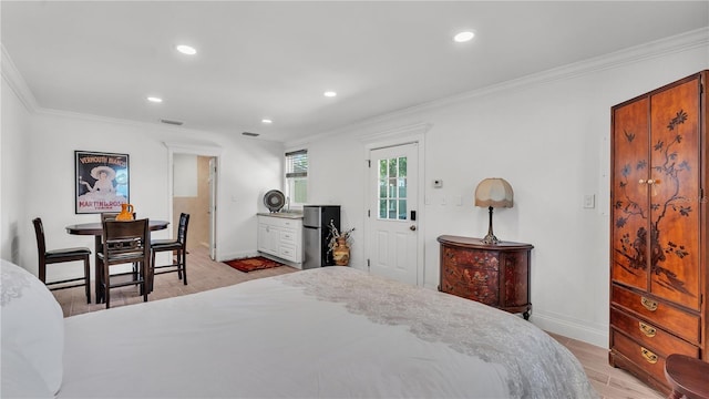 822 W Patterson St, Lakeland, FL 33803 - bedroom with light wood finished floors, recessed lighting, ornamental molding, and baseboards