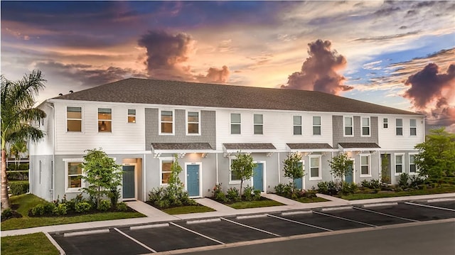 8540 Daybreak St, Sarasota, FL 34241 - view of front of house with uncovered parking and roof with shingles