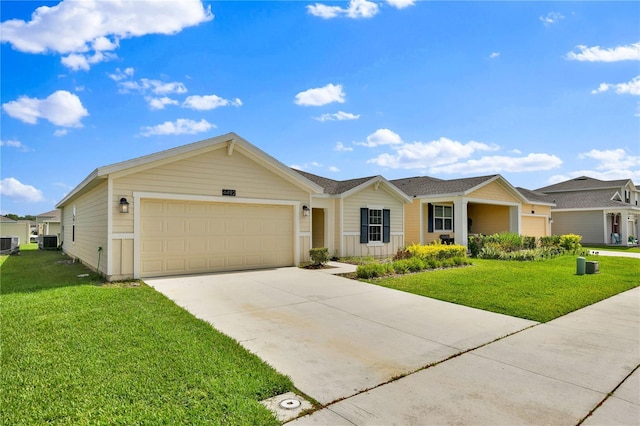 4492 Bluff Oak Loop, Kissimmee, FL 34746 - ranch-style home with an attached garage, a front yard, concrete driveway, and central air condition unit