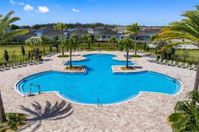 4492 Bluff Oak Loop, Kissimmee, FL 34746 - community pool featuring a residential view