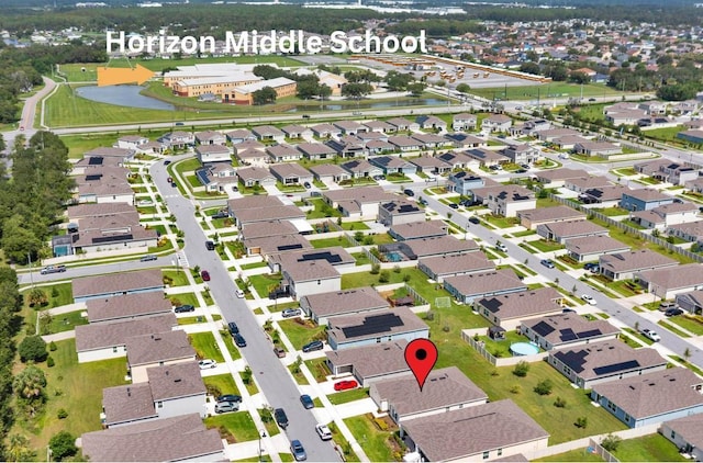 4492 Bluff Oak Loop, Kissimmee, FL 34746 - aerial view of property and surrounding area with a nearby body of water