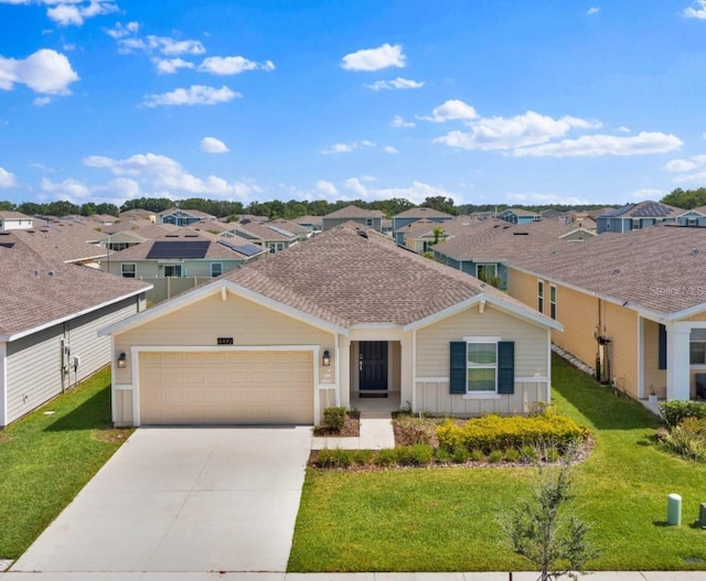 4492 Bluff Oak Loop, Kissimmee, FL 34746 - view of front of house featuring a residential view, driveway, a garage, and a front yard