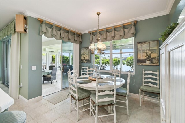 201 Largo Dr, Kissimmee, FL 34759 - dining space with a wall mounted AC, light tile patterned floors, ornamental molding, and a chandelier