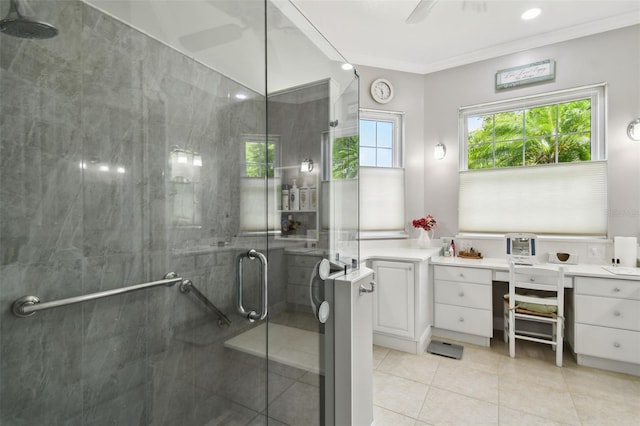 201 Largo Dr, Kissimmee, FL 34759 - full bath with tile patterned floors, a shower stall, vanity, crown molding, and a ceiling fan