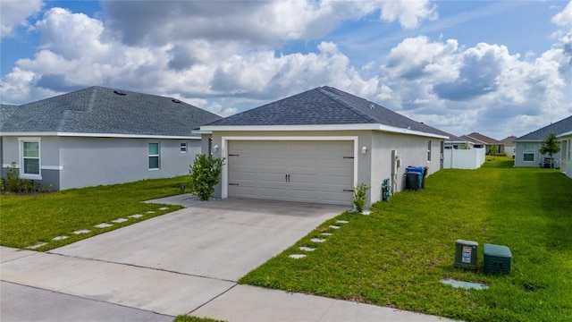 1719 Daystar Dr, Haines City, FL 33844 - view of property exterior featuring stucco siding, a garage, concrete driveway, and a yard