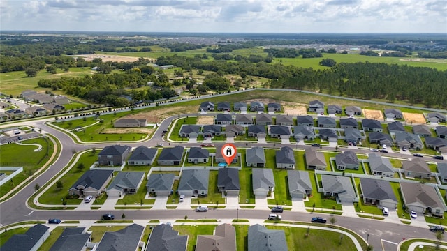 1719 Daystar Dr, Haines City, FL 33844 - aerial view of property and surrounding area with nearby suburban area