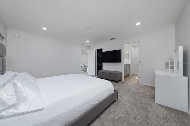 1719 Daystar Dr, Haines City, FL 33844 - bedroom featuring light colored carpet, recessed lighting, and ensuite bath
