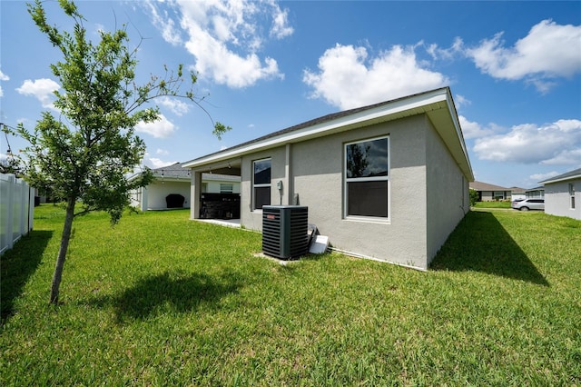 1719 Daystar Dr, Haines City, FL 33844 - back of house with stucco siding