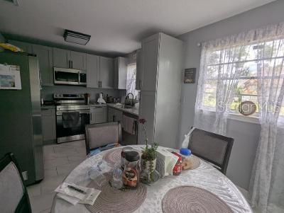946 Delano Ct, Kissimmee, FL 34758 - kitchen with appliances with stainless steel finishes and a sink