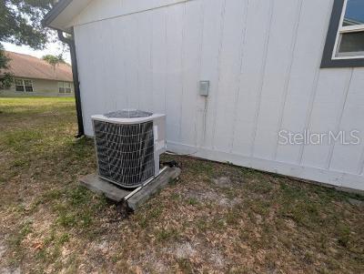 946 Delano Ct, Kissimmee, FL 34758 - exterior view of central AC