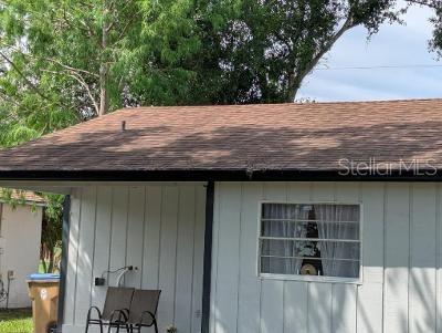 946 Delano Ct, Kissimmee, FL 34758 - exterior view of roof with shingles