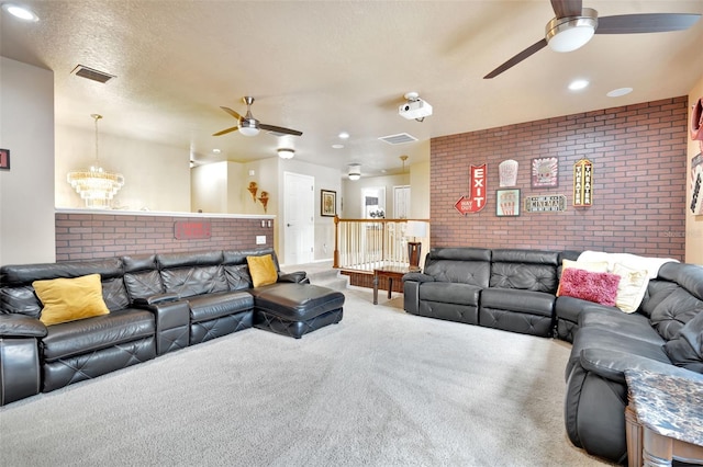 6932 Gray Catbird Loop, Wesley Chapel, FL 33545 - living area with ceiling fan, carpet, brick wall, and recessed lighting