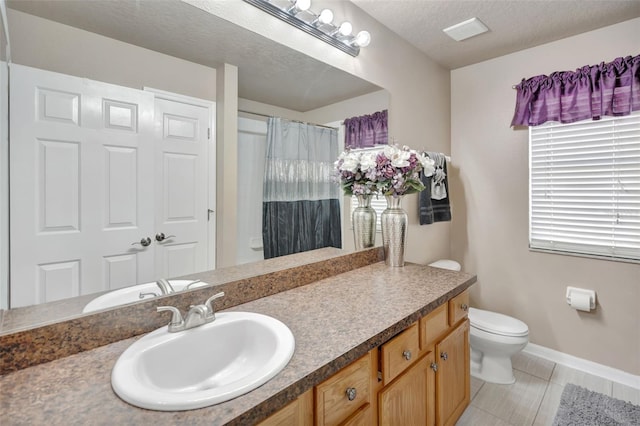 6932 Gray Catbird Loop, Wesley Chapel, FL 33545 - bathroom with vanity, a textured ceiling, and a shower with shower curtain
