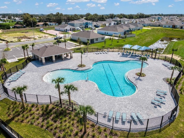 3886 Whitney Way, Haines City, FL 33844 - community pool with a residential view and a patio
