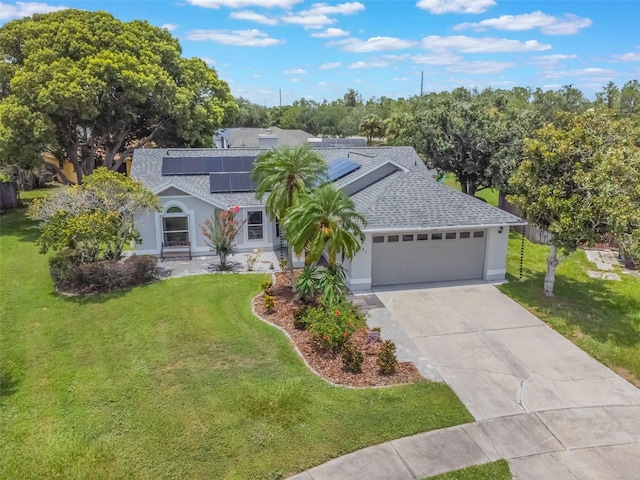 1631 Woodbay Ct, Kissimmee, FL 34744 - single story home with a shingled roof, stucco siding, and an attached garage