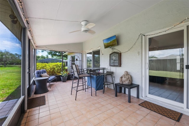 1631 Woodbay Ct, Kissimmee, FL 34744 - sunroom featuring a ceiling fan and outdoor dining space