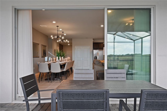2176 Lelani Cir, Davenport, FL 33897 - dining room with a chandelier and recessed lighting