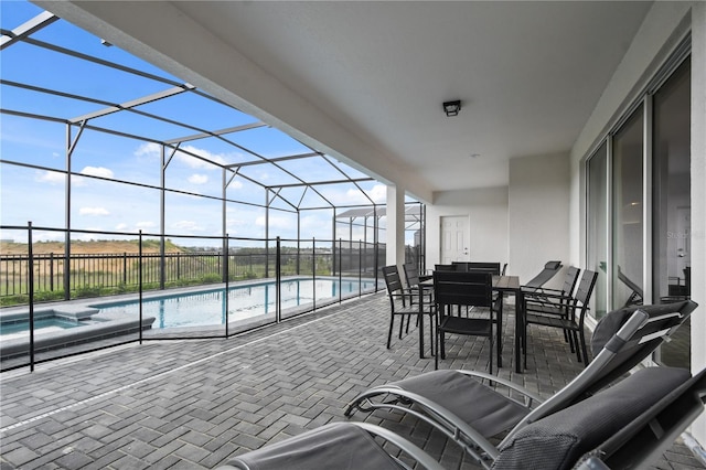 2176 Lelani Cir, Davenport, FL 33897 - view of patio / terrace featuring a lanai, outdoor dining area, and a pool with connected hot tub