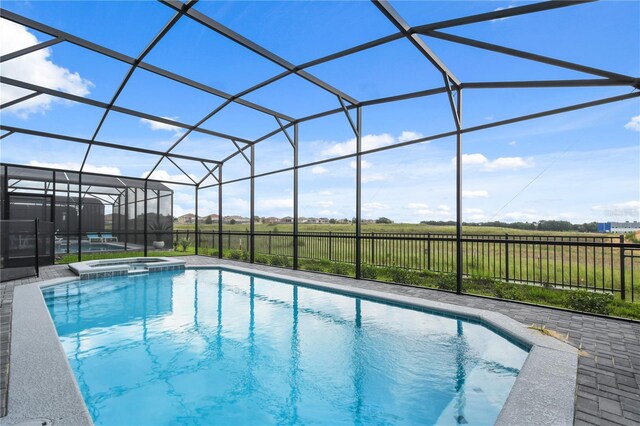 2176 Lelani Cir, Davenport, FL 33897 - view of pool featuring a lanai and a pool with connected hot tub