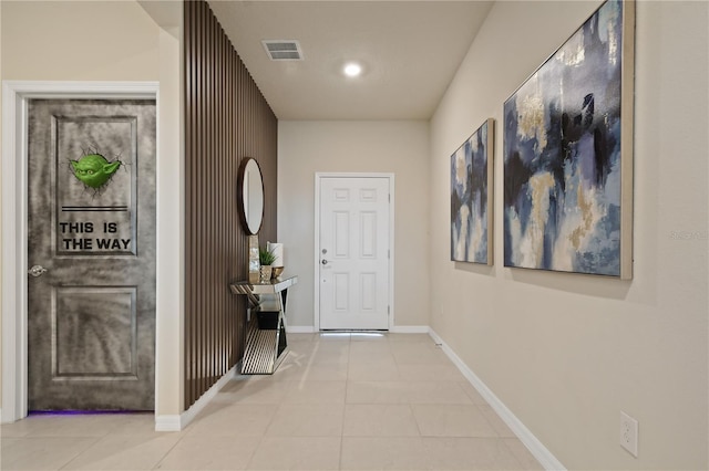 2176 Lelani Cir, Davenport, FL 33897 - entryway with light tile patterned floors, baseboards, and recessed lighting