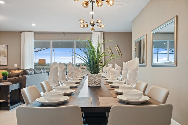 2176 Lelani Cir, Davenport, FL 33897 - dining space featuring a chandelier and plenty of natural light