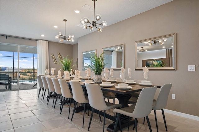 2176 Lelani Cir, Davenport, FL 33897 - dining space with a chandelier, light tile patterned floors, healthy amount of natural light, recessed lighting, and baseboards