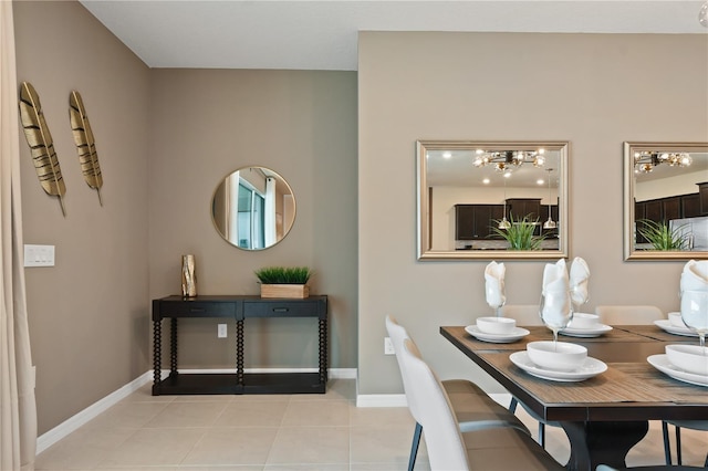 2176 Lelani Cir, Davenport, FL 33897 - tiled dining space with a chandelier and baseboards