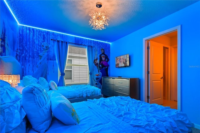 2176 Lelani Cir, Davenport, FL 33897 - bedroom featuring a chandelier