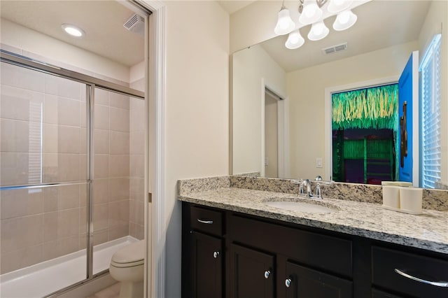 2176 Lelani Cir, Davenport, FL 33897 - full bath with a shower stall, vanity, toilet, and a chandelier