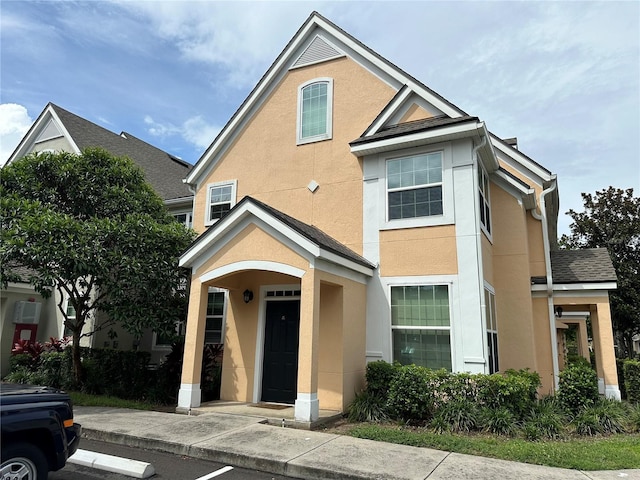 3301 Soho St Unit 104, Orlando, FL 32835 - view of front facade with stucco siding