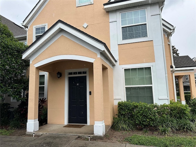 3301 Soho St Unit 104, Orlando, FL 32835 - entrance to property with stucco siding