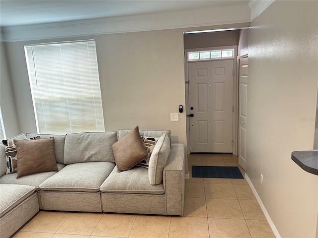 3301 Soho St Unit 104, Orlando, FL 32835 - foyer entrance featuring light tile patterned floors, crown molding, and baseboards