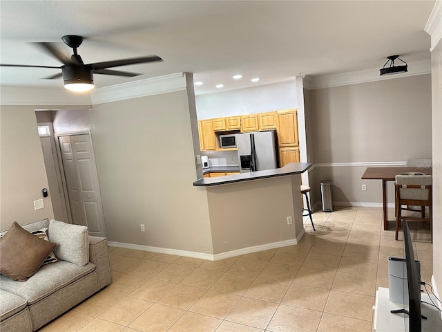 3301 Soho St Unit 104, Orlando, FL 32835 - living area featuring a ceiling fan, crown molding, recessed lighting, light tile patterned floors, and baseboards