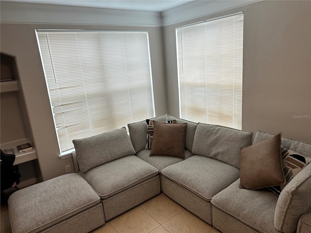 3301 Soho St Unit 104, Orlando, FL 32835 - living room with light tile patterned flooring and ornamental molding