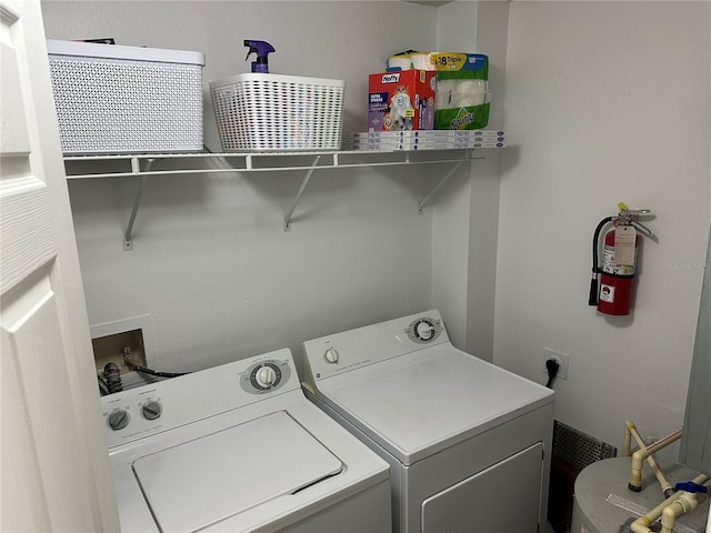 3301 Soho St Unit 104, Orlando, FL 32835 - laundry area with washing machine and dryer