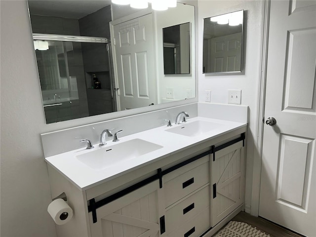 3301 Soho St Unit 104, Orlando, FL 32835 - bathroom featuring double vanity and a stall shower