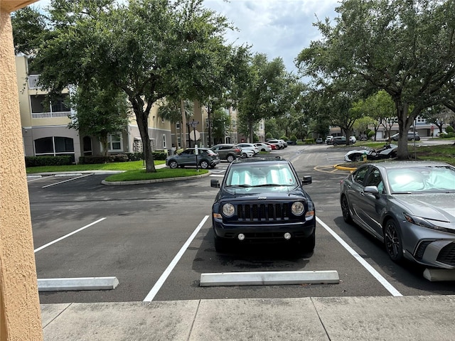3301 Soho St Unit 104, Orlando, FL 32835 - view of uncovered parking lot
