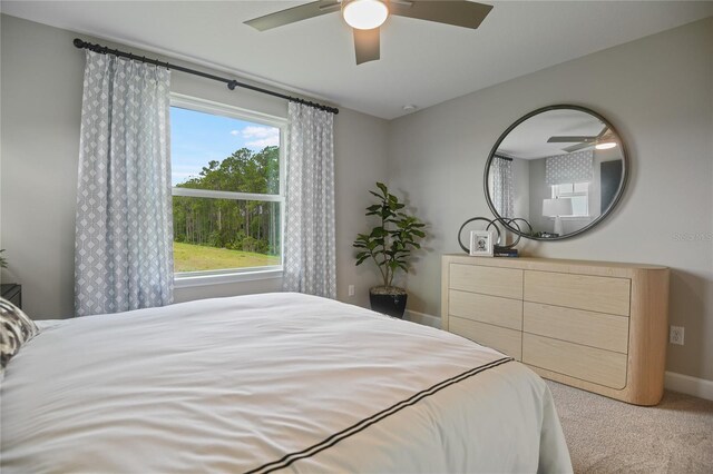 222 Thornberry Way, Palm Coast, FL 32164 - bedroom featuring carpet flooring and ceiling fan