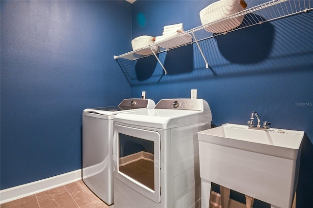 222 Thornberry Way, Palm Coast, FL 32164 - laundry area featuring independent washer and dryer and baseboards