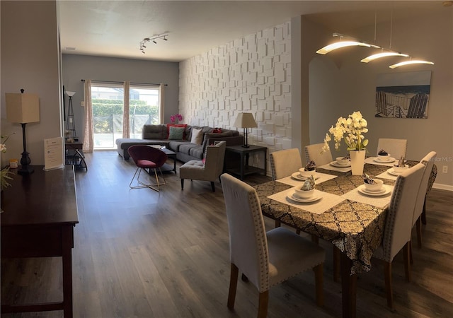 8121 Fan Palm Way, Kissimmee, FL 34747 - dining space with dark wood finished floors