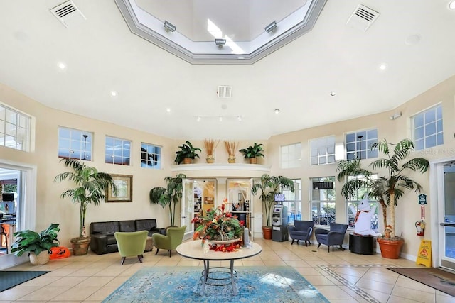8121 Fan Palm Way, Kissimmee, FL 34747 - building lobby with a towering ceiling and recessed lighting