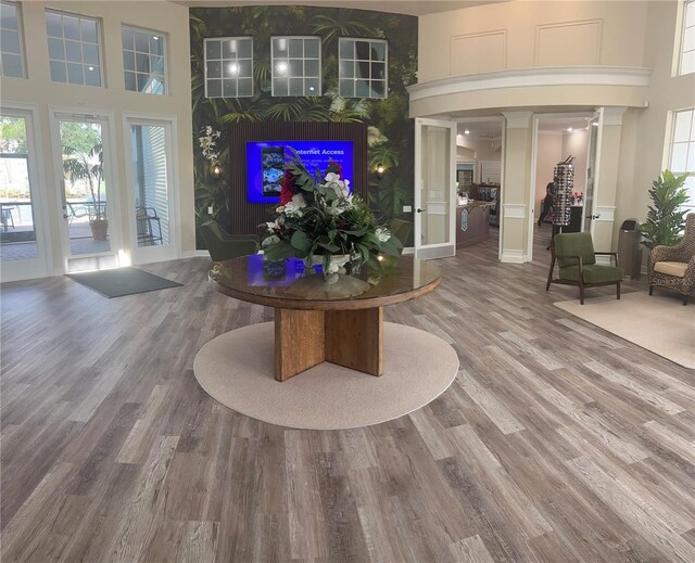 8121 Fan Palm Way, Kissimmee, FL 34747 - living room featuring a high ceiling and wood finished floors