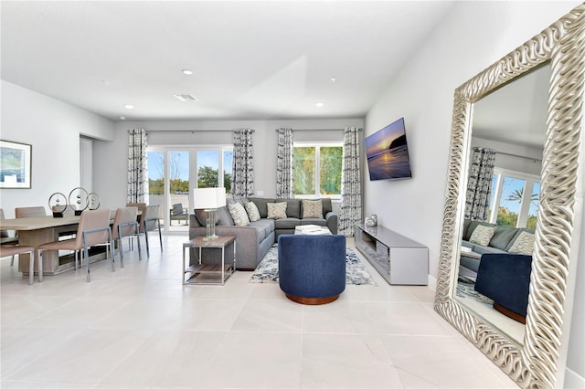 7770 Sandy Ridge Dr Unit 142, Kissimmee, FL 34747 - living area featuring tile patterned floors and recessed lighting